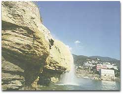 Partial view of the Municipality beach and the hot waterfall, near Capri hotel